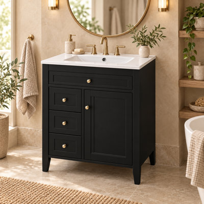 Meuble-lavabo moderne de 61 cm (24 po) avec lavabo en céramique, porte à fermeture amortie, 3 tiroirs et tablette de rangement.
