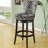 Alesja Swivel Counter or Bar Height Armless Bar Stool with Footrest in Faux Leather and Black Wood-17752755-41670666