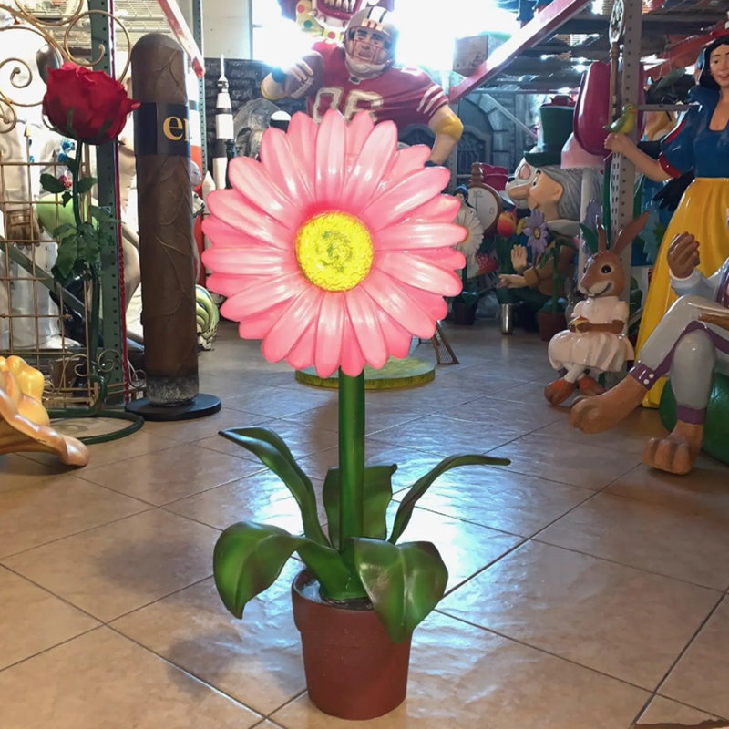 Petite statue de marguerite rose en pot