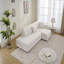 Canapé d'angle en forme de L avec coussins décoratifs