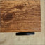 Table basse moderne en bois aggloméré avec texture en bois, durable et élégante pour un espace de vie amélioré