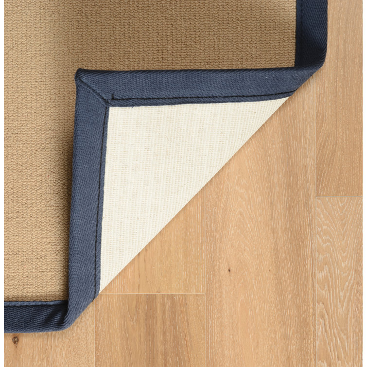 Nannette Handmade Medium Beige Berber with Navy Blue Cotton Border Area Rug