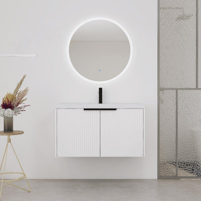 Meuble-lavabo mural avec lavabo en résine et portes à fermeture en douceur, offrant beaucoup de rangement et une conception unique pour améliorer la salle de bain