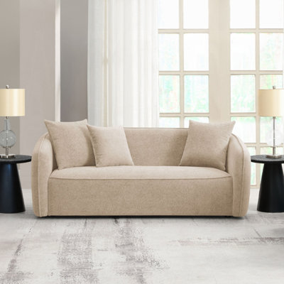 Canapé beige en chenille avec 3 coussins