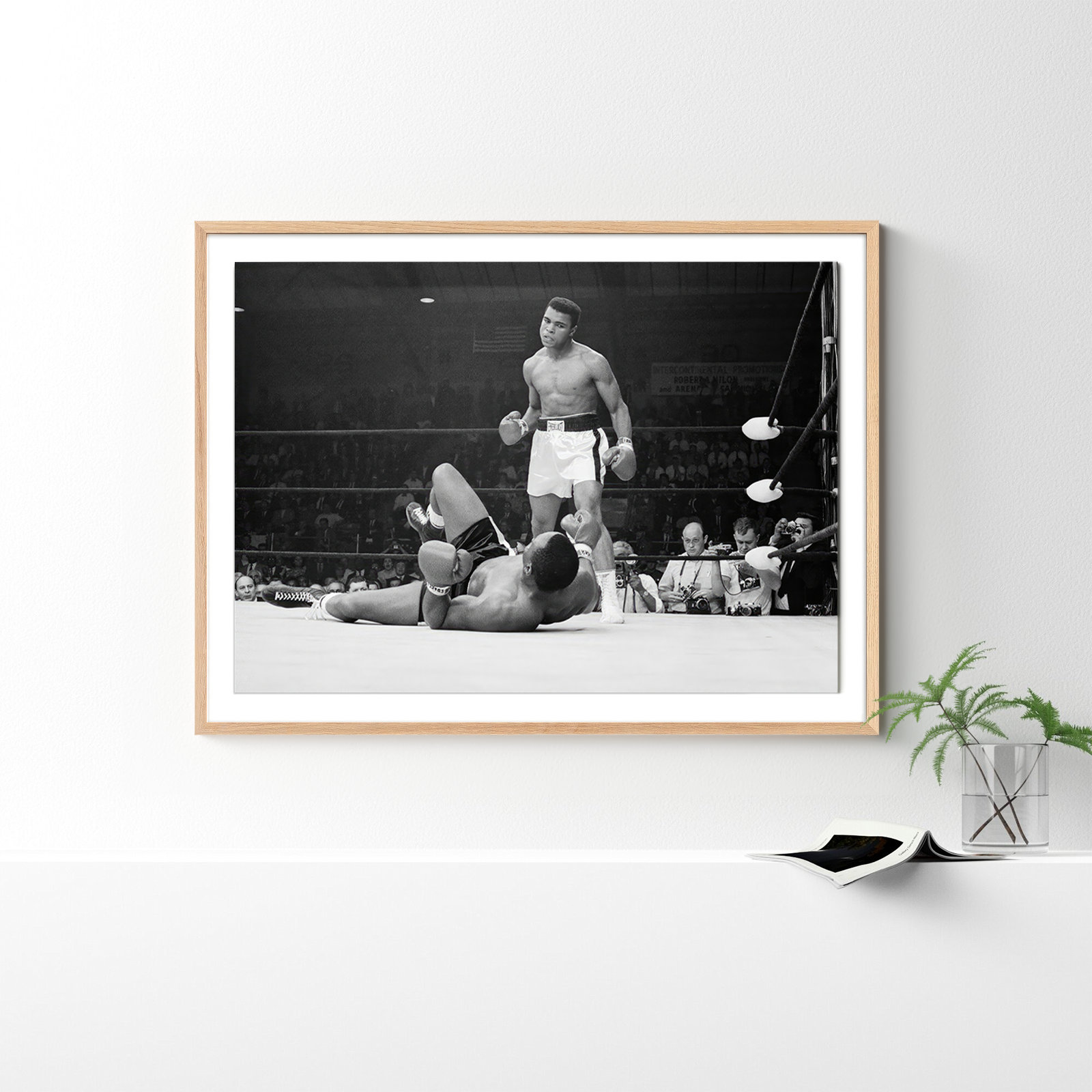Boxers Muhammad Ali And Sonny Liston Fighting by Getty Images, 36" H x 48" W, Black Maple Framed