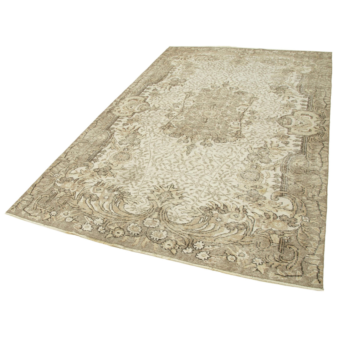 Handgefertigter Teppich Egan aus Wolle in Beige