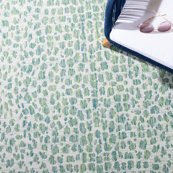 Wade Logan® Animal Print Ivory/Green Indoor / Outdoor Area Rug ...