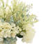 Centres de table mixtes en hortensia, bruyère et eucalyptus dans un vase en verre