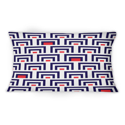 Coussin décoratif à motif géométrique bleu et rouge