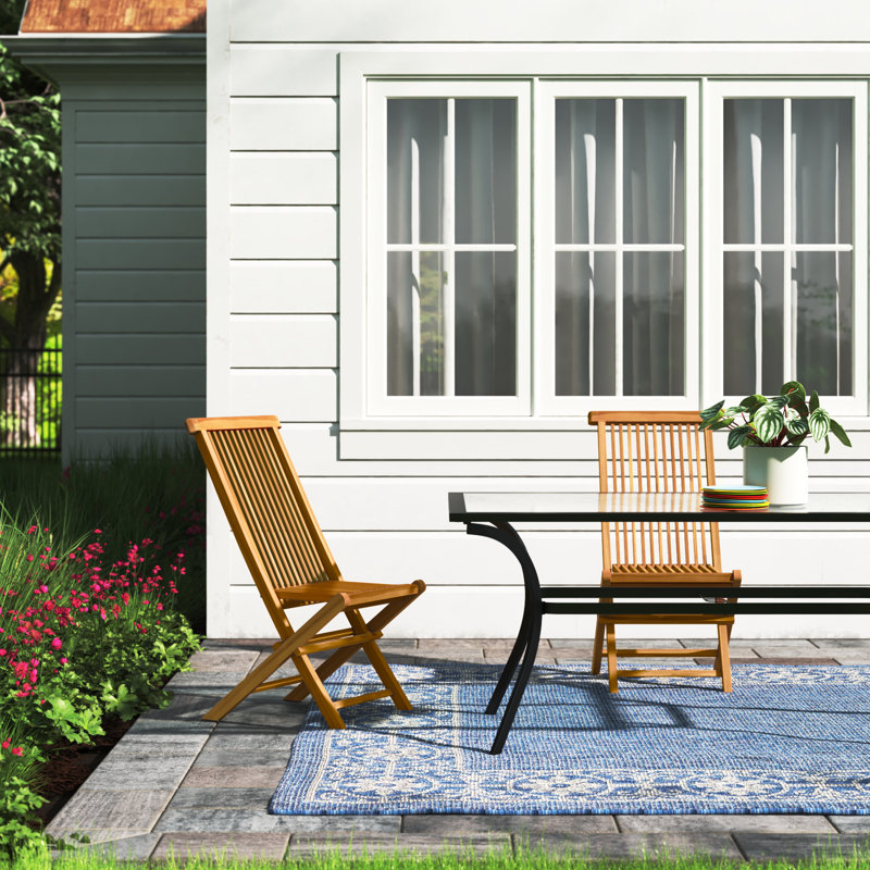 Chaise de salle à manger d'extérieur pliante en bois de teck Allani
