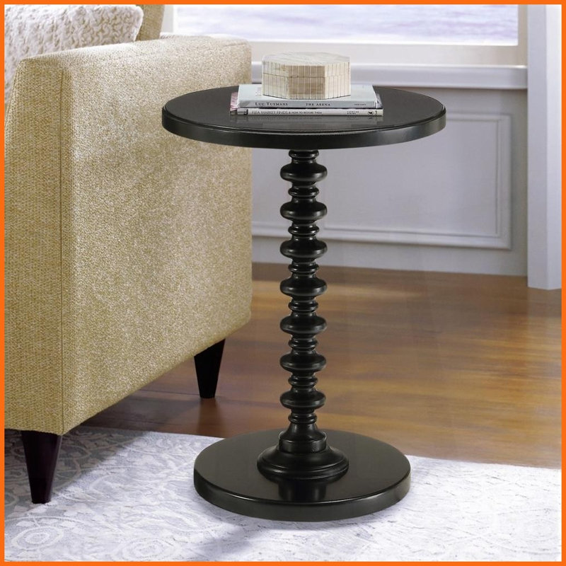 Table basse ronde noire peu encombrante avec plateau en bois massif, polyvalente pour les petits espaces Maison de campagne / décor traditionnel