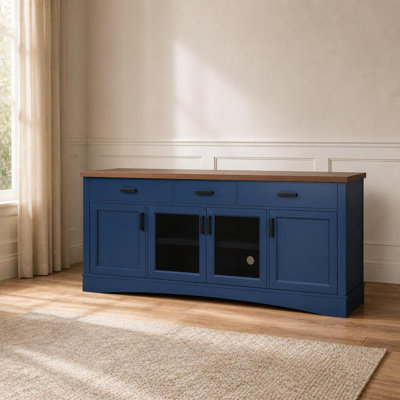 Meuble télé multimédia de 170 cm de large avec portes vitrées, tiroirs de rangement et tablettes réglables. Console multimédia robuste en bois d'ingénierie avec gestion des câbles intégrée. Convient aux écrans jusqu'à 165 cm. Solution de rangement polyvalente pour le mobilier et les appareils multimédias du salon.