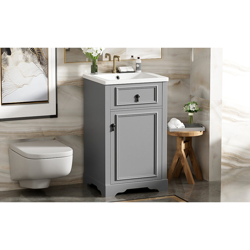 Meuble-lavabo de 20 pouces avec lavabo en céramique, porte à fermeture en douceur et poignée pour faciliter les petits travaux de rangement
