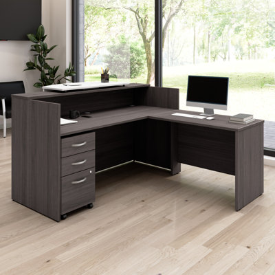 Bureau de réception en bois manufacturé en forme de L de 72 po x 72 po Arrive avec 3 pédales et un comptoir réversible Arrive