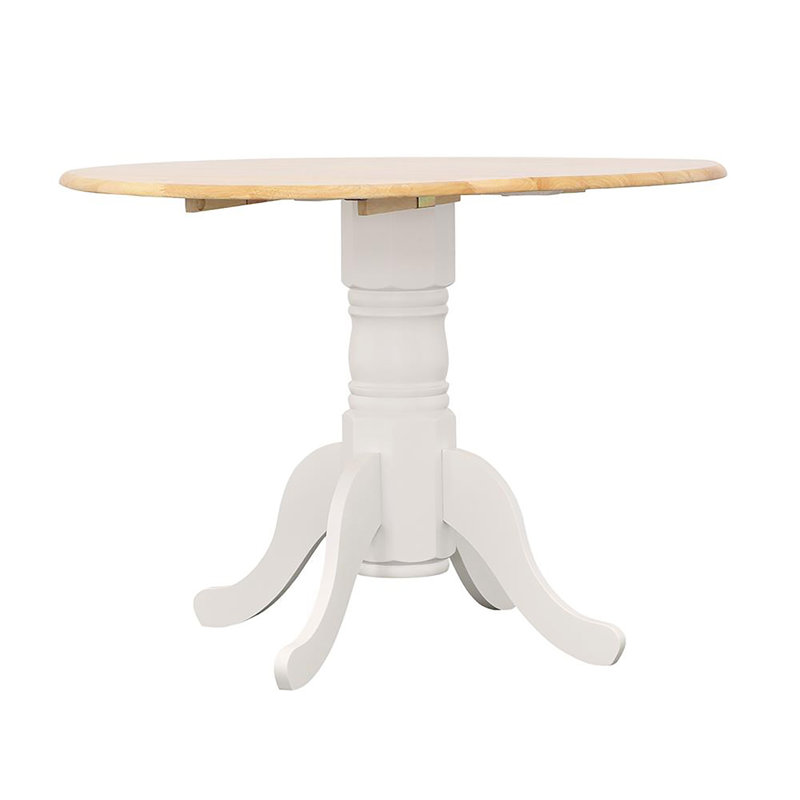 Versatile Drop Leaf Table With Stylish Pedestal Base And Ornamental Legs For Intimate Dining And Space Adaptability.