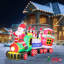 Train du Père Noël avec pingouins gonflable