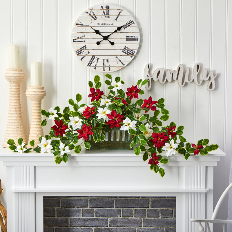 Arrangements floraux Holly et centres de table dans un pot à fleurs