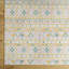 Tapis intérieur / extérieur en polypropylène tissé à la machine en blanc cassé Yumie-2070742971