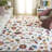 Abhinandan Hand Tufted Wool/Cotton Performance Floral Rug in Red/Green/Ivory-483994962