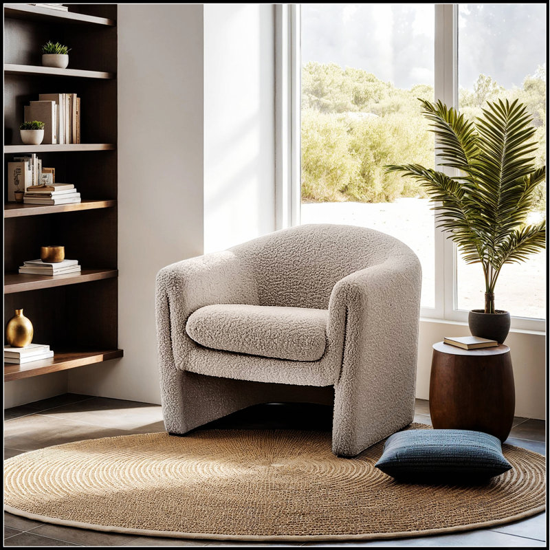 Fauteuil d'appoint de style contemporain avec un design compact en forme de U, un tissu bouclé et une finition champignon pour le salon principal
