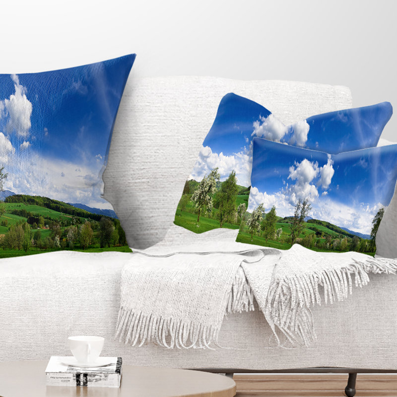 Coussin décoratif à imprimé paysage vert et bleu printemps