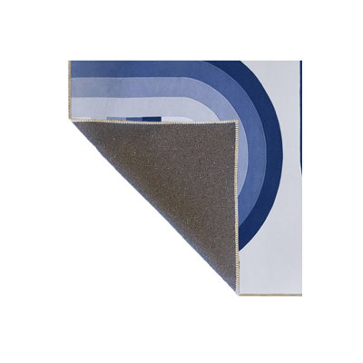 Tapis bleu lavable à rayures