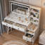 Bureau de coiffeuse Philomena avec miroir lumineux à 3 couleurs DEL et station de charge
