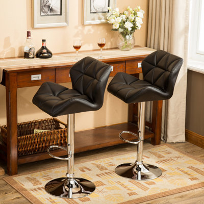 Diljana Swivel Upholstered Adjustable Height Counter Stool with Metal Frame
