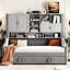 Lit de jour gris avec accoudoirs à DEL, tablettes de rangement et lit gigogne escamotable, conception orientée confort, lueur ambiante pour une atmosphère relaxante, idéal pour accueillir des invités-1043726315