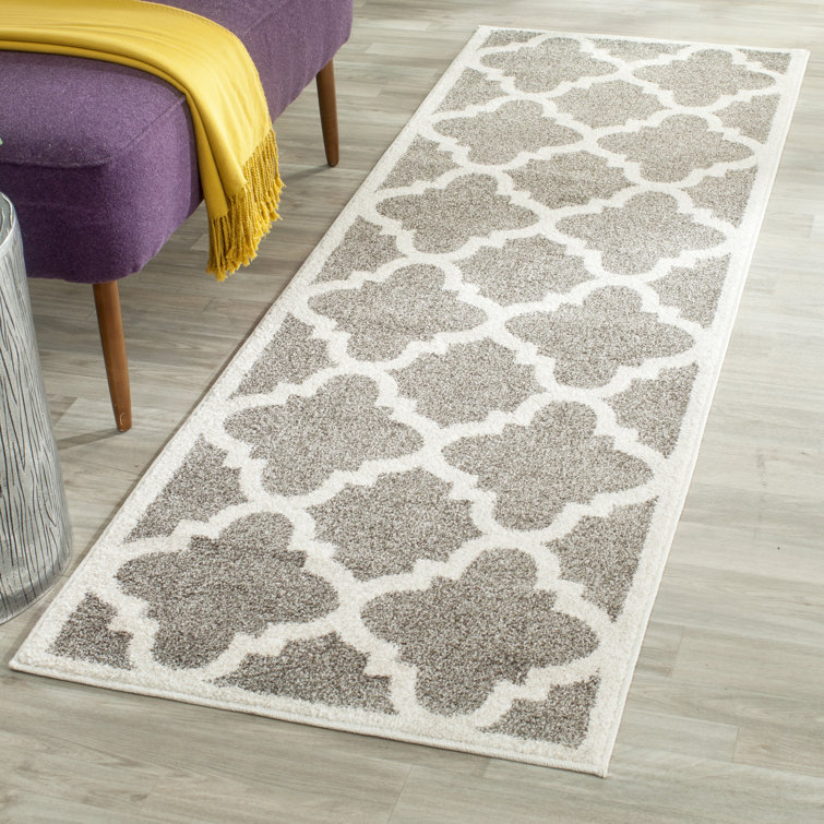 Kathy Geometric Hand Woven Indoor / Outdoor Area Rug