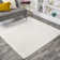 Arcie Solid Low-Pile Ivory Rug