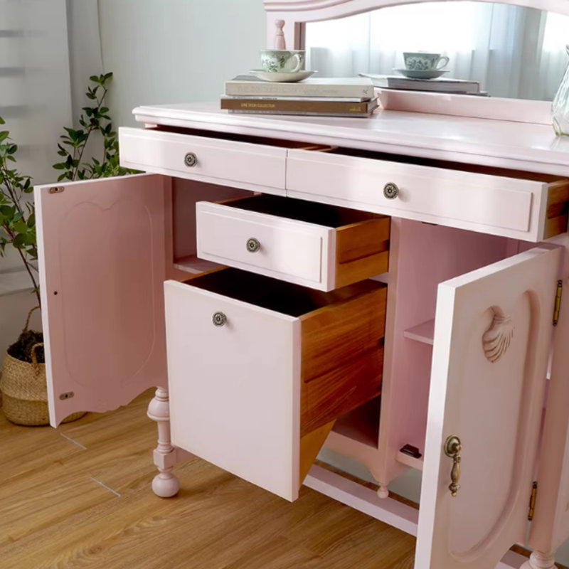 Commode rose en bois massif avec