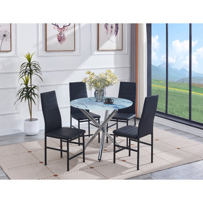 Ensemble de table de salle à manger moderne en verre effet marbre avec 4 chaises en similicuir