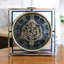 Degraffenreid Analog Metal Table Clock | Black Quartz Desk Clock with Moving Gears Numerals, Decorative Home Accent