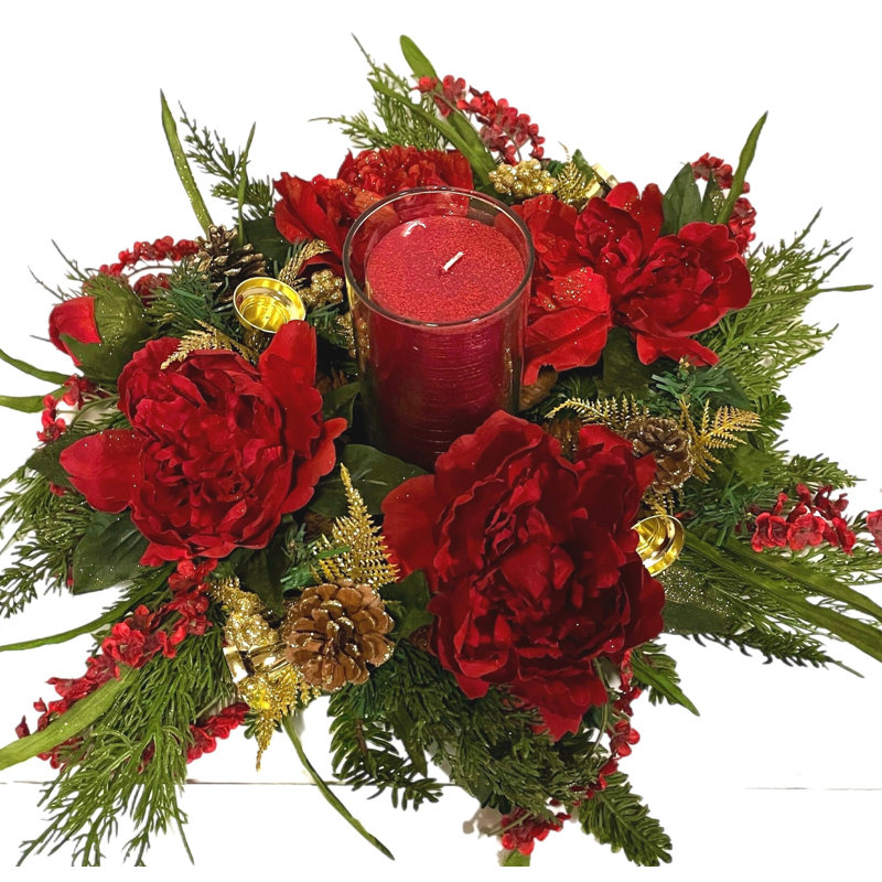 Bougie de Noël avec pivoines rouges