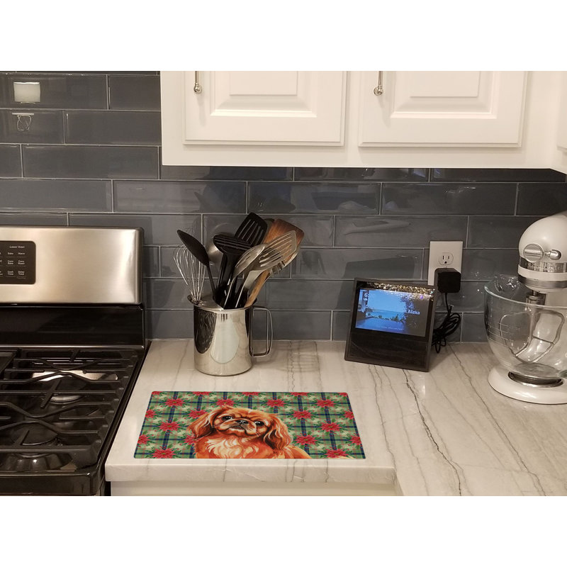 Red Pekingese Christmas PoinsettIas Glass Cutting Board