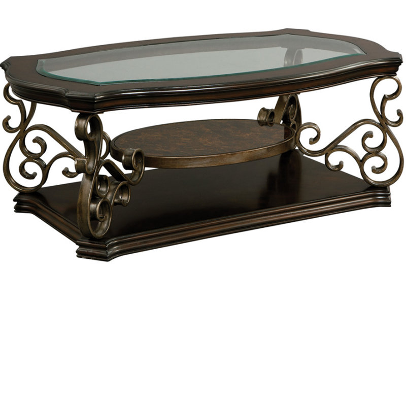 Table basse ovale avec plateau en verre et tablette