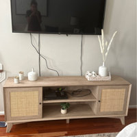 Linets Natural Rattan TV Console TV Stand for 65+ inch TV, 25 Tall Highboy Entertainment Center Bay Isle Home Color: Oak