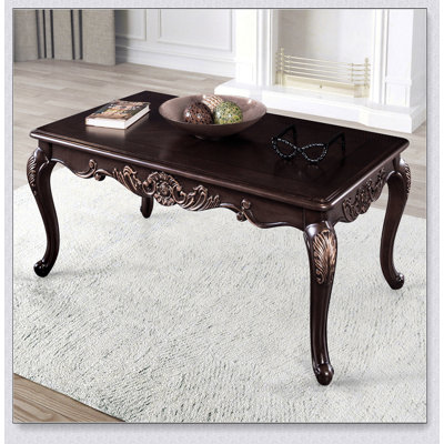 Table basse rectangulaire 1 pièce avec style traditionnel, pieds courbés, structure en bois massif et motif sculpté complexe