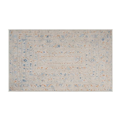 Tapis beige lavable à la machine