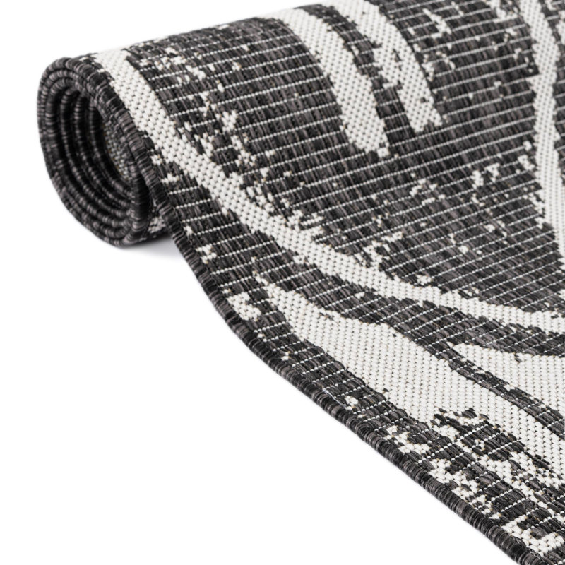 Tapis intérieur / extérieur gris anthracite / blanc en polypropylène tissé à la machine Wilmslow
