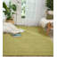 Tapis vert en laine tissé à la main et à plat-449278657