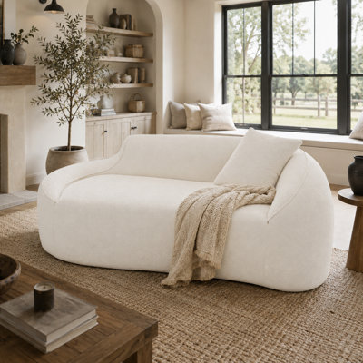 Canapé-lit moderne avec méridienne courbée moderne avec assise profonde et coussin pour le salon
