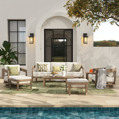 Harmonti Patio 5 Person Aluminum Swivel Conversation Set With Ottomans And Cushions
