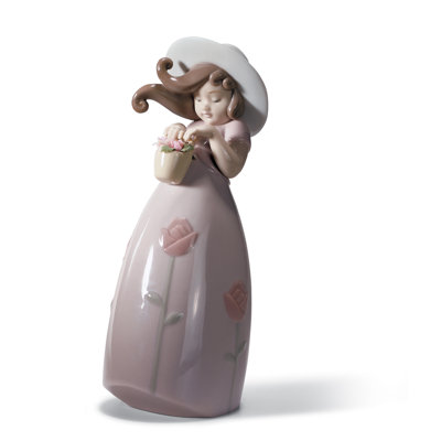 Figurine petite fille rose