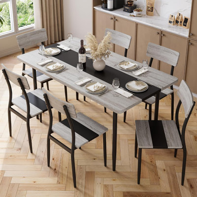 Ensemble de table à manger 7 pièces pour 6 personnes, structure en métal et plateau en MDF, plateau bicolore gris et noir.
