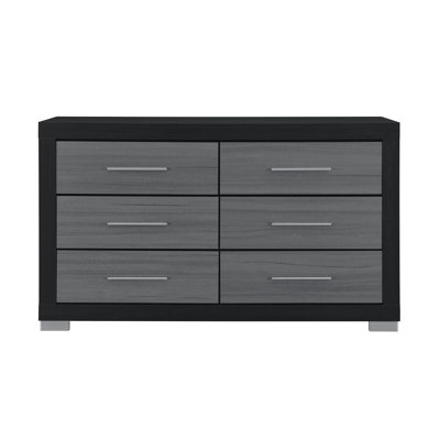 La commode Elsa noire et grise avec six tiroirs spacieux, parfaite pour les solutions de rangement modernes et élégantes.