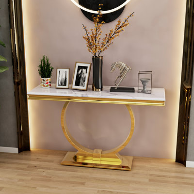 Console de luxe avec base en U en métal et plateau à texture brillante