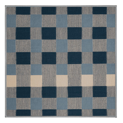 Tapis gris à carreaux lavable à la machine