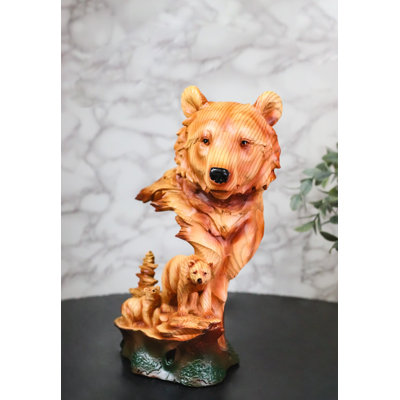 Figurine d'ours noir avec tête d'ours